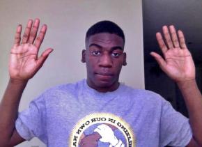 De'Jaun Correia, Troy Davis' nephew, holds up his hands in a sign of solidarity